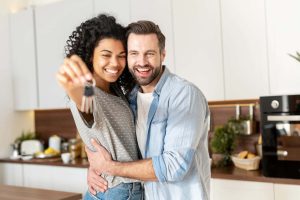 Couple With Keys to New Home