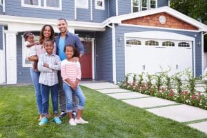 Family in Front of New Home