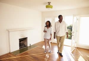 A couple on their final walk through in new home