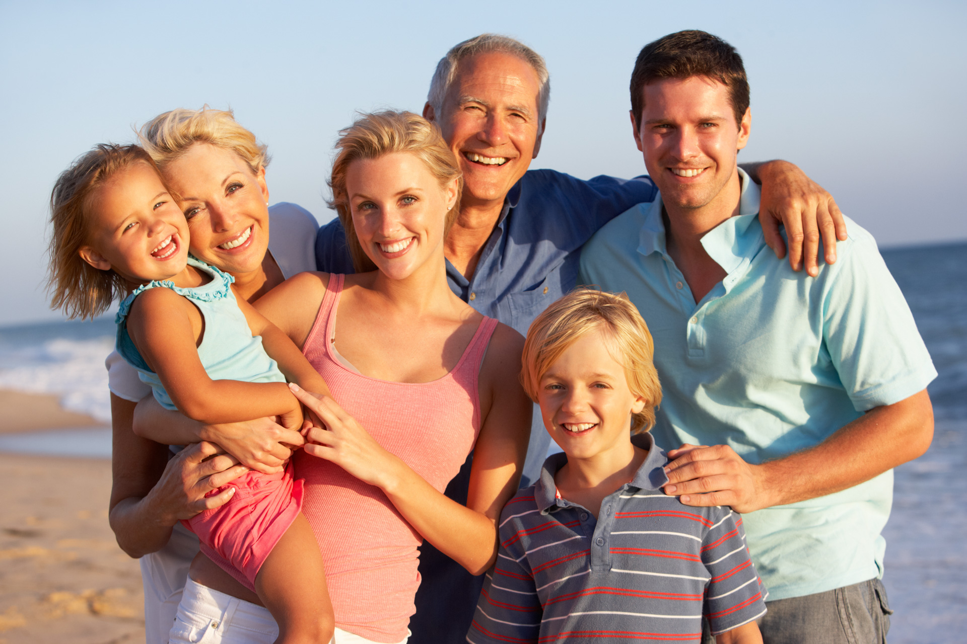 Large family portrait on the beach