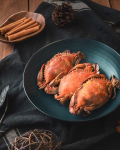 Steamed blue crab dinner